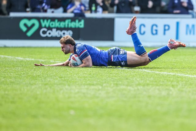 Josh Rourke of Wakefield Trinity goes over for a try during the Betfred Super League round 8 match Wakefield Trinity vs Bradford Bulls at DIY Kitchens Stadium, Wakefield, United Kingdom on 18 April 2026

(Photo by Alfie Cosgrove/News Images)