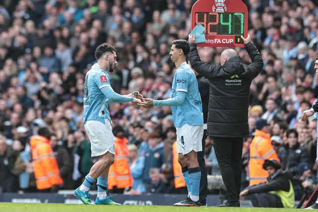 Rayan Cherki of Manchester City is substituted for Tijjani Reijnders of Manchester City during the Emirates FA Cup Quarter-Final match Manchester City vs Liverpool at Etihad Stadium, Manchester, United Kingdom on 04 April 2026

(Photo by Mark Cosgrove/News Images)