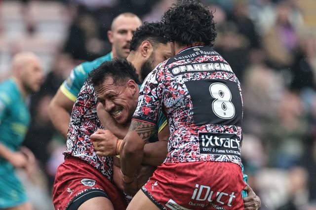 Sauaso Sue of Hull KR is tackled by Isaac Liu of Leigh Leopards and Joe Ofahengaue of Leigh Leopards during the Betfred Super League round 11 match Leigh Leopards vs Hull KR at Leigh Sports Village, Leigh, United Kingdom on 16 May 2026

(Photo by Mark Cosgrove/News Images)