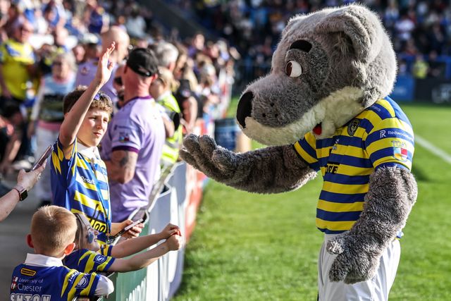 Warrington Wolves mascot ‘Wolfie’ meets the fans during the Betfred Super League round 5 match Warrington Wolves vs Castleford Tigers at The Halliwell Jones Stadium, Warrington, United Kingdom on 21 March 2026

(Photo by Alfie Cosgrove/News Images)
