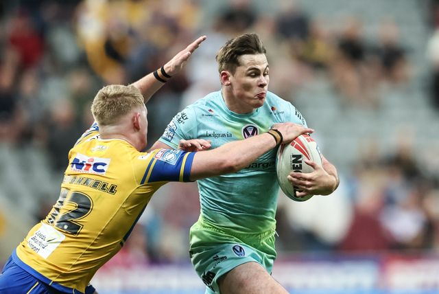 Jack Welsby of St. Helens is tackled by James McDonnell of Leeds Rhinos during the Betfred Magic Weekend 2025 match St Helens vs Leeds Rhinos at St. James's Park, Newcastle, United Kingdom, 3rd May 2025

(Photo by Mark Cosgrove/News Images)