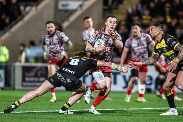 Frankie Halton of Leigh Leopards is tackled by Paul Vaughan of York Knights and Jack Martin of York Knights during the Betfred Super League round 8 match York Knights vs Leigh Leopards at LNER Community Stadium, York, United Kingdom on 17 April 2026

(Photo by Alfie Cosgrove/News Images)