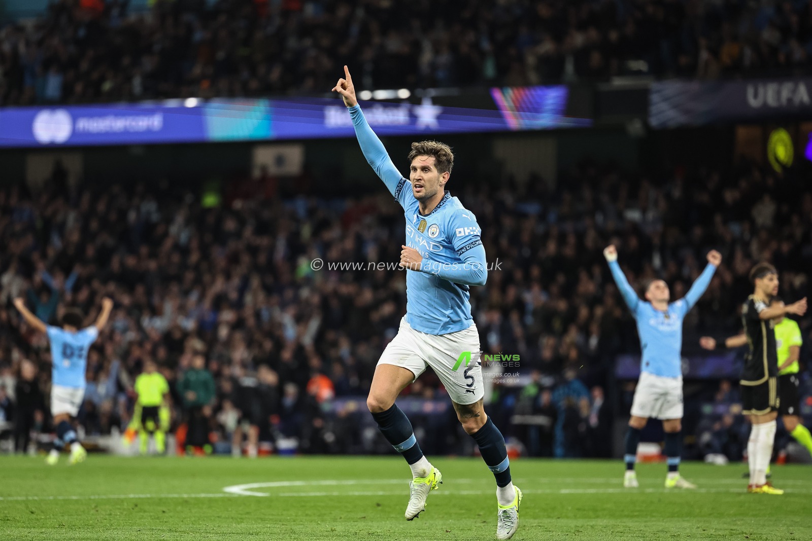 John Stones of Manchester City celebrates his goal to make it 3-0 during the UEFA Champions League, League Stage Manchester City v Sparta Prague at Etihad Stadium, Manchester, United Kingdom, 23rd October 2024

(Photo by Mark Cosgrove/News Images)