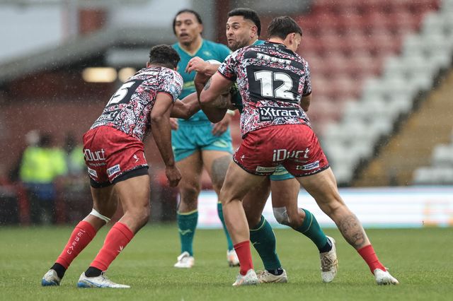 Rhyse Martin of Hull KR is tackled by Owen Trout of Leigh Leopards during the Betfred Super League round 11 match Leigh Leopards vs Hull KR at Leigh Sports Village, Leigh, United Kingdom on 16 May 2026

(Photo by Mark Cosgrove/News Images)