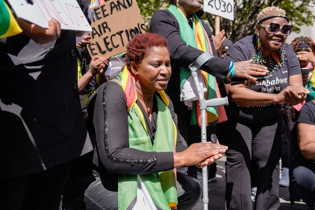 UK-based Zimbabweans gather outside the Zimbabwe Embassy in London on 18 April 2026 to protest the Constitution of Zimbabwe Amendment (No. 3) Bill, which critics say would extend President Mnangagwa’s rule until 2030 and strip citizens of the direct vote for president.

(Photo by Maynard Manyowa/News Images)