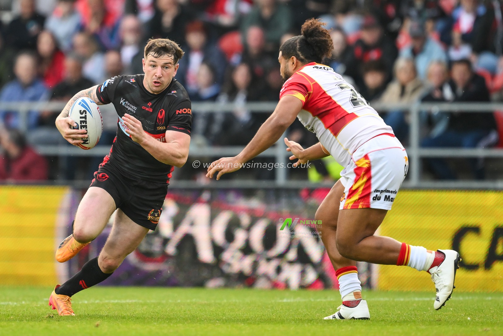 Mark Percival of St. Helens makes a break during the Betfred Super League Round 13 match St Helens vs Catalans Dragons at Totally Wicked Stadium, St Helens, United Kingdom, 31st May 2024

(Photo by Craig Thomas/News Images)