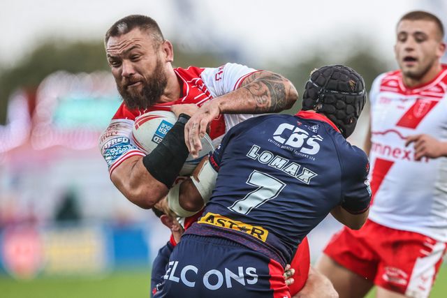 Jared Waerea-Hargreaves of Hull KR is tackled by Jonny Lomax of St. Helens during the Betfred Super League Semi Final 2 match Hull KR vs St Helens at Sewell Group Craven Park, Kingston upon Hull, United Kingdom, 3rd October 2025

(Photo by Alfie Cosgrove/News Images)