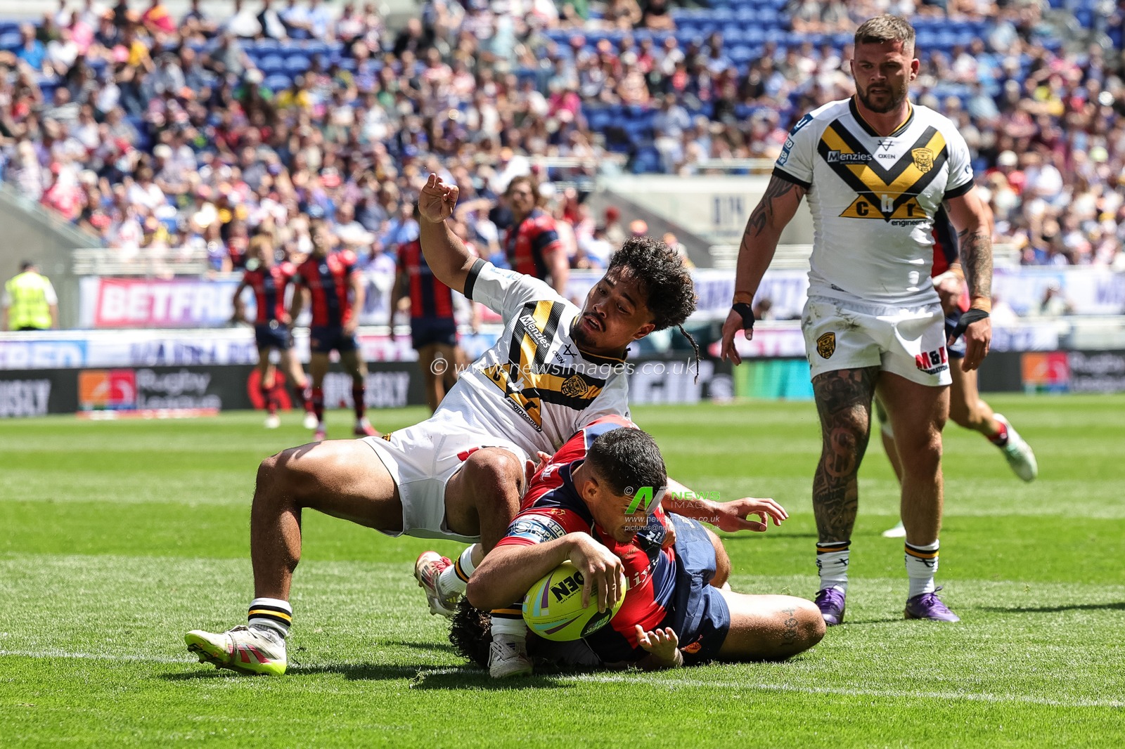 Caleb Hamlin-Uele of Wakefield Trinity goes over for a try during the Betfred Super League Magic Weekend match Wakefield Trinity vs Castleford Tigers at Hill Dickinson Stadium, Liverpool, United Kingdom on 05 July 2026

(Photo by Mark Cosgrove/News Images)
