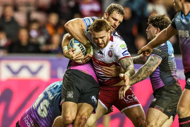 Adam Keighran of Wigan Warriors is tackled during the Betfred Super League match Wigan Warriors vs Hull FC at The Brick Community Stadium, Wigan, United Kingdom on 21 February 2026

(Photo by Alfie Cosgrove/News Images)