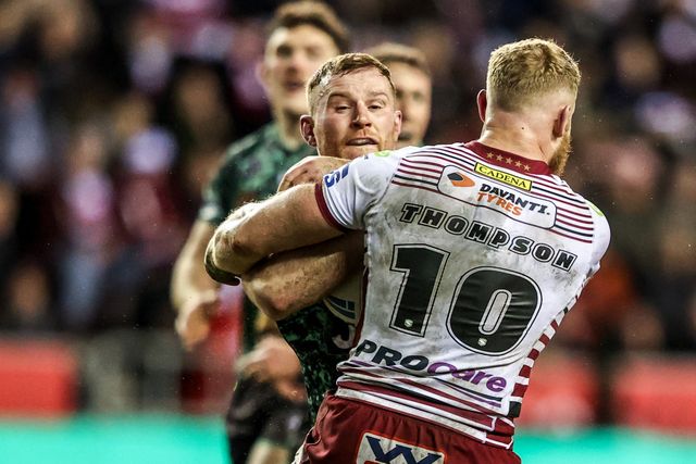 Jack Hughes of Leigh Leopards is tackled by Luke Thompson of Wigan Warriors during the Betfred Super League match Wigan Warriors vs Leigh Leopards at The Brick Community Stadium, Wigan, United Kingdom on 26 February 2026

(Photo by Alfie Cosgrove/News Images)
