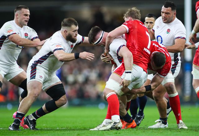 Tom Curry of England is tackled by Jac Morgan of Wales during the 2025 Guinness 6 Nations match Wales vs England at Principality Stadium, Cardiff, United Kingdom, 15th March 2025

(Photo by Andrew Lewis/News Images)