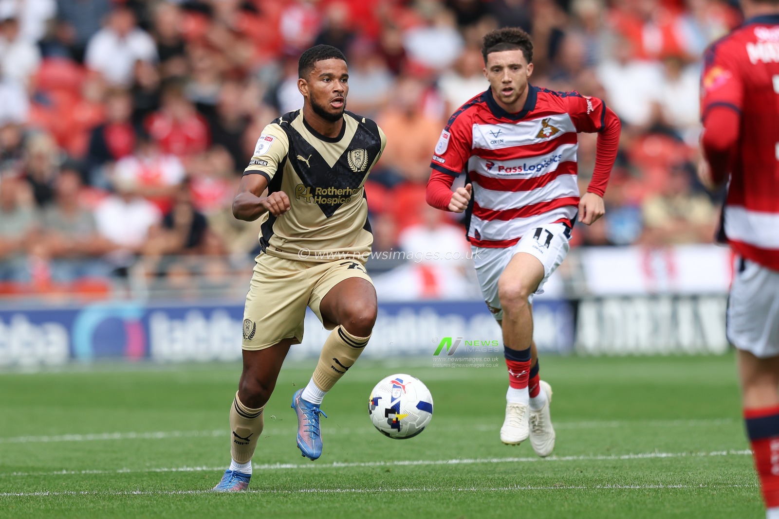 Denzel Hall of Rotherham United attacks during the Sky Bet League 1 match Doncaster Rovers vs Rotherham United at Eco-Power Stadium, Doncaster, United Kingdom, 30th August 2025

(Photo by Alex Roebuck/News Images)