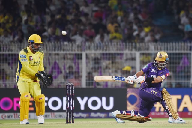 Kolkata Knight Riders' captain Ajinkya Rahane hits a four and CSK Captain MS Dhoni Wicket keeping during the 2025 IPL match between Kolkata Knight Riders and Chennai Super Kings at Eden Gardens on May 07, 2025, in Kolkata, India. Photo by Debajyoti Chakraborty.(Photo: Debajyoti Chakraborty/News Images)