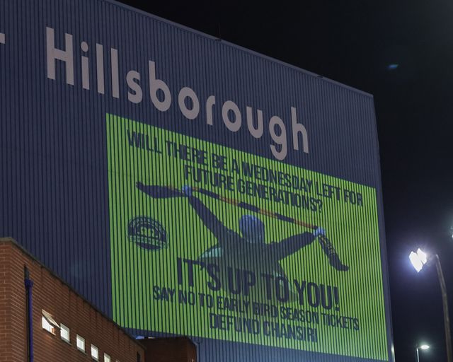 Fans protest against Sheffield Wednesday owner Dejphon Chansiri as they shine projected images onto the Kop stand during the Sky Bet Championship match Sheffield Wednesday vs Middlesbrough at Hillsborough, Sheffield, United Kingdom, 22nd October 2025

(Photo by Mark Cosgrove/News Images)