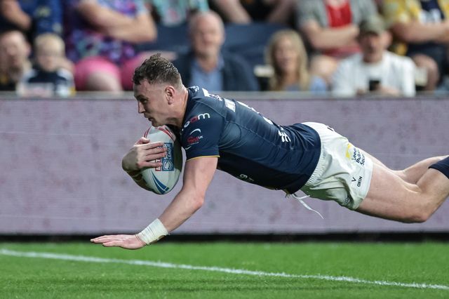 Harry Newman of Leeds Rhinos goes over for a try during the Betfred Super League round 12 match Leeds Rhinos vs Huddersfield Giants at AMT Headingley Stadium, Leeds, United Kingdom on 22 May 2026

(Photo by Mark Cosgrove/News Images)