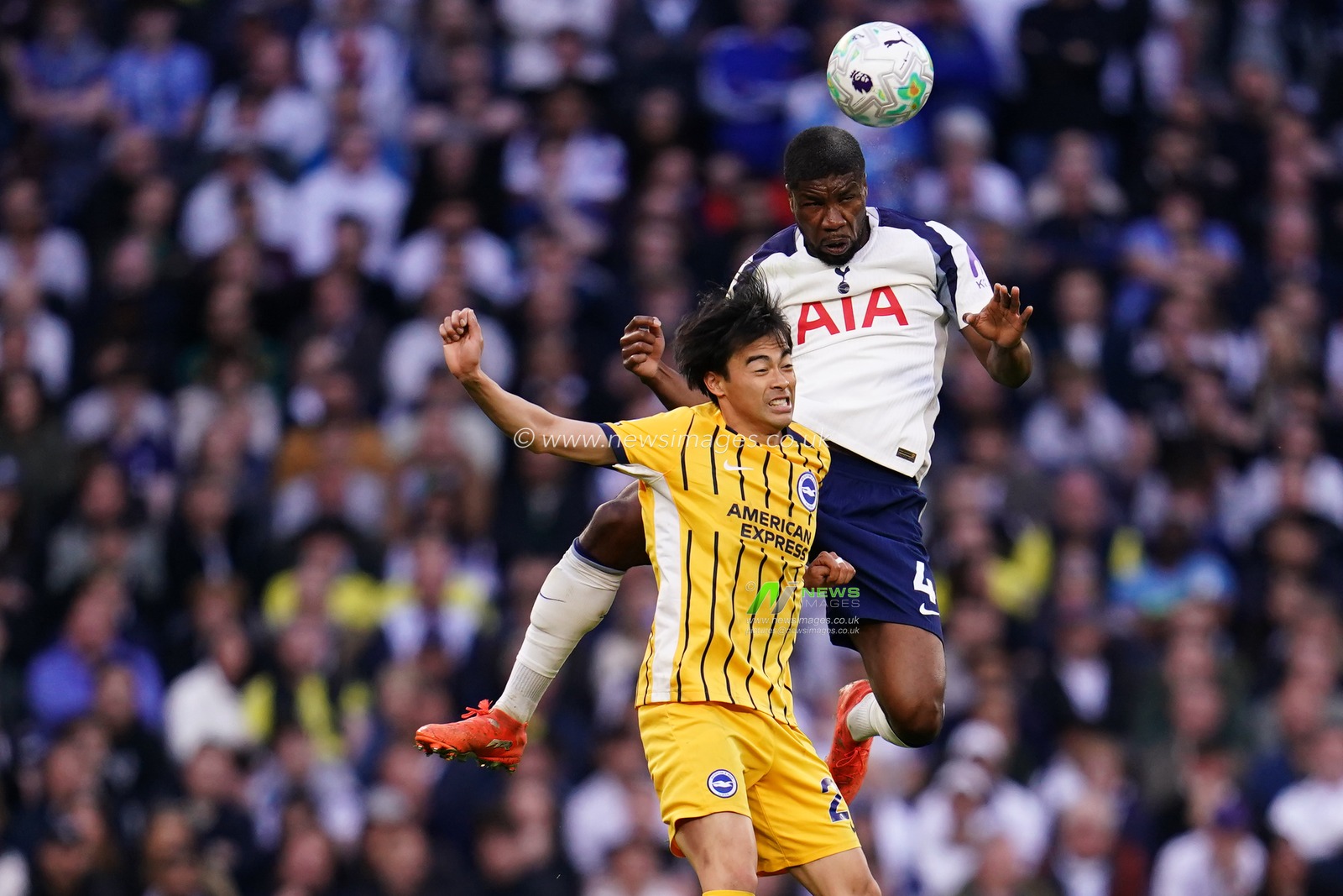 Kevin Danso of Tottenham Hotspur wins header against Kaoru Mitoma of Brighton & Hove Albion during the Premier League match Tottenham Hotspur vs Brighton & Hove Albion at Tottenham Hotspur Stadium, London, United Kingdom on 18 April 2026

(Photo by Harvey Murphy/News Images)