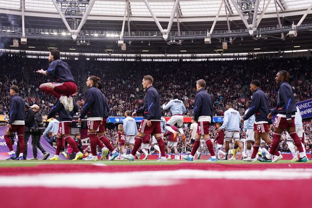 Arsenal players walk out ahead of kick off during the Premier League match West Ham United vs Arsenal at London Stadium, London, United Kingdom on 10 May 2026

(Photo by Harvey Murphy/News Images)