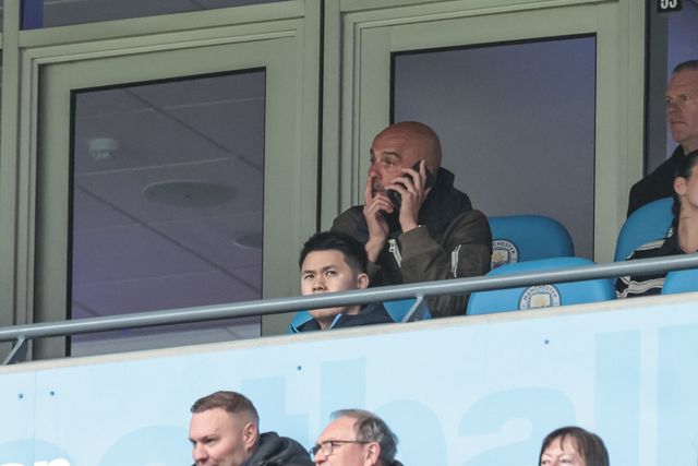 Pep Guardiola manager of Manchester City on his phone as City lead 4-0 during the Emirates FA Cup Quarter-Final match Manchester City vs Liverpool at Etihad Stadium, Manchester, United Kingdom on 04 April 2026

(Photo by Mark Cosgrove/News Images)