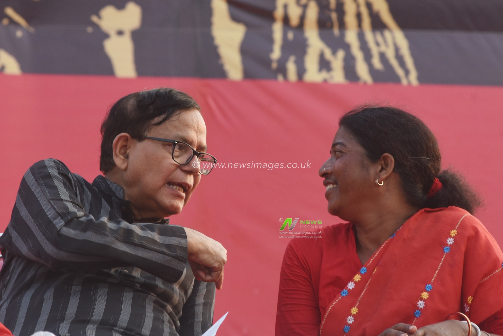 CPI(M) West Bengal State Secretary and Polit Bureau member Md Salim and Tribal Leader Bannya Tudu   at the thousands of farmers, workers, agricultural laborers, and slum dwellers who attend a mass meeting to protest against different labor policies of the state and central government at the Brigade Parade Ground in Kolkata on April 20, 2025. With the battle for the 2026 assembly elections around the corner, CPI(M) state secretary Mohammad Salim, clad in a black kurta, thundered from the podium for a change in the state governance after three consecutive terms of Mamata Banerjee-led Trinamool Congress. Notwithstanding the 'zero' in assembly, the leftists looked more enthusiastic than ever while sounding the poll bugle. "The Supreme Court has rubbed the Chief Minister's nose. RSS is building a base in the state thanks to Mamata Banerjee. Our leaders do not come from Tollygunge," Mohammad Salim attacked Banerjee in his customary challenging tone. Photo by Debajyoti Chakraborty.(Photo: Debajyoti Chakraborty/News Images)