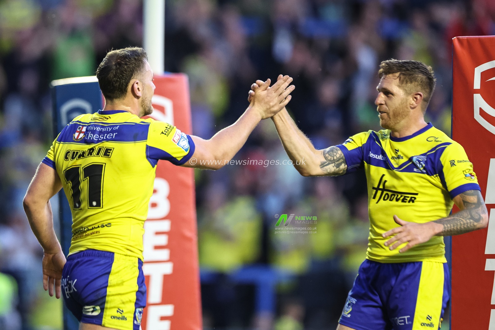 Ben Currie of Warrington Wolves celebrates his try with Marc Sneyd of Warrington Wolves during the Betfred Super League Round 13 match Warrington Wolves vs Castleford Tigers at Halliwell Jones Stadium, Warrington, United Kingdom, 30th May 2025

(Photo by Mark Cosgrove/News Images)
