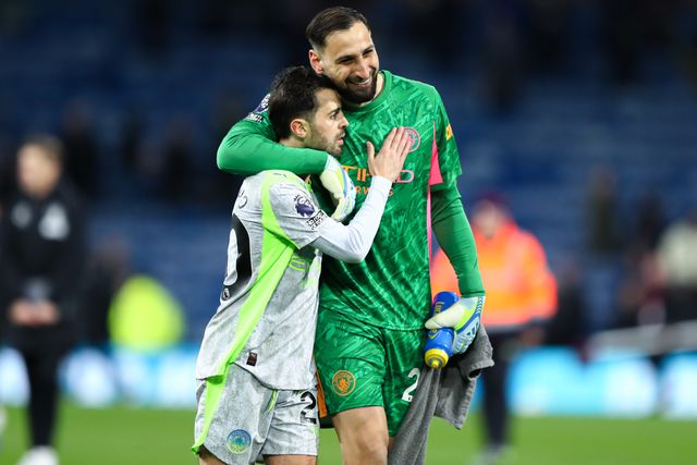 Bernardo Silva of Manchester City and Manchester City goalkeeper Gianluigi Donnarumma celebrates 0-1 win after the Premier League match Burnley vs Manchester City at Turf Moor, Burnley, United Kingdom on 22 April 2026

(Photo by Jorge Horsted/News Images)