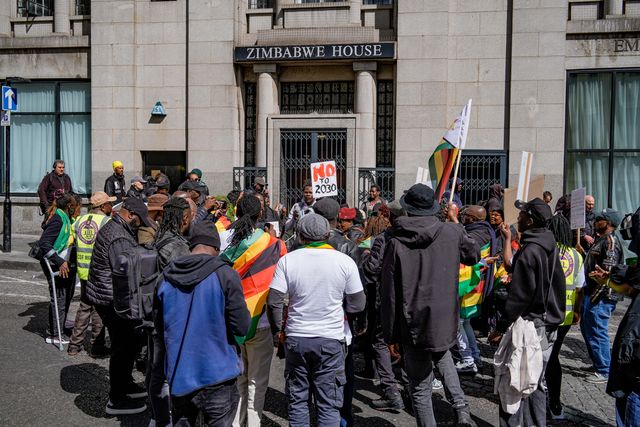 UK-based Zimbabweans gather outside the Zimbabwe Embassy in London on 18 April 2026 to protest the Constitution of Zimbabwe Amendment (No. 3) Bill, which critics say would extend President Mnangagwa’s rule until 2030 and strip citizens of the direct vote for president.

(Photo by Maynard Manyowa/News Images)