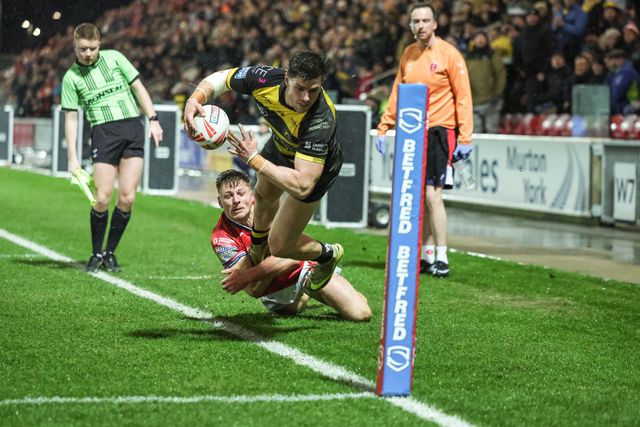 Tom Davies of Hull KR stops Scott Galeano of York Knights from going over in the corner as he takes him out of play during the Betfred Super League Round 1 match York Knights vs Hull KR at LNER Community Stadium, Lincoln, United Kingdom on 12 February 2026

(Photo by Mark Cosgrove/News Images)