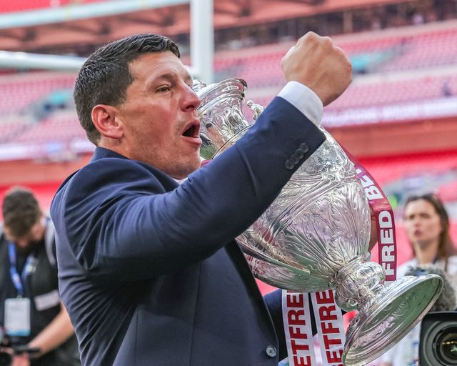 Matt Peet head coach of Wigan Warriors lifts the  Betfred Challenge Cup Trophy up to the fans as he celebrates the win during the Betfred Challenge Cup Final match Wigan Warriors vs Hull KR at Wembley Stadium, London, United Kingdom on 30 May 2026

(Photo by Mark Cosgrove/News Images)