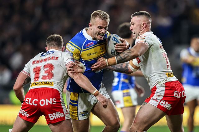 Cooper Jenkins of Leeds Rhinos is tackled by Curtis Sironen of St. Helens during the Betfred Super League play-off Eliminator 1 match Leeds Rhinos vs St Helens at Headingley Stadium, Leeds, United Kingdom, 27th September 2025

(Photo by Alfie Cosgrove/News Images)