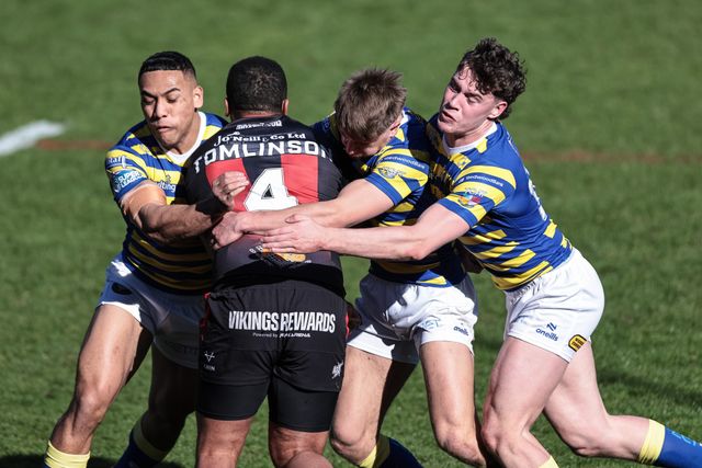 Keenen Tomlinson of Goole Vikings is tackled by Albert Hopoate of Warrington Wolves during the Betfred Challenge Cup round 4 match Goole Vikings vs Warrington Wolves at The Halliwell Jones Stadium, Warrington, United Kingdom on 14 March 2026

(Photo by Mark Cosgrove/News Images)