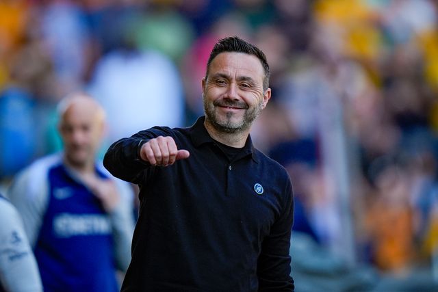 Roberto De Zerbi manager of Tottenham Hotspur smiles and greets former player Angel Gomes of Wolverhampton Wanderers during the Premier League match Wolverhampton Wanderers vs Tottenham Hotspur at Molineux, Wolverhampton, United Kingdom on 25 April 2026

(Photo by Maynard Manyowa/News Images)