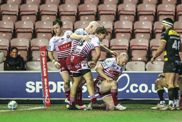 Liam Marshall of Wigan Warriors celebrates his try during the Betfred Super League round 5 match Wigan Warriors vs York Knights at The Brick Community Stadium, Wigan, United Kingdom on 19 March 2026

(Photo by Alfie Cosgrove/News Images)