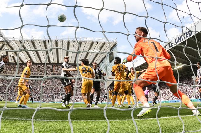 Dan Burn of Newcastle United scores past Brighton & Hove Albion goalkeeper Bart Verbruggen to make it 2-0 during the Premier League match Newcastle Untied vs Brighton & Hove Albion at St. James's Park, Newcastle, United Kingdom on 02 May 2026

(Photo by Mark Cosgrove/News Images)