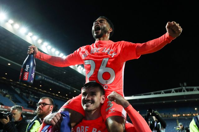 Jay Dasilva of Coventry City celebrates promotion back to the Premier League after the Sky Bet Championship match Blackburn Rovers vs Coventry City at Ewood Park, Blackburn, United Kingdom on 17 April 2026

(Photo by Jorge Horsted/News Images)