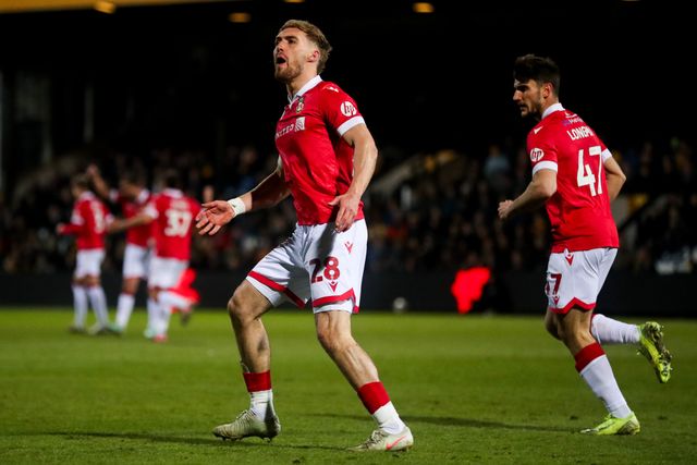 Sam Smith of Wrexham AFC celebrates his goal to make it 2-2 during the Sky Bet League 1 match Cambridge United vs Wrexham at Abbey Stadium, Cambridge, United Kingdom, 1st April 2025

(Photo by Izzy Poles/News Images)
