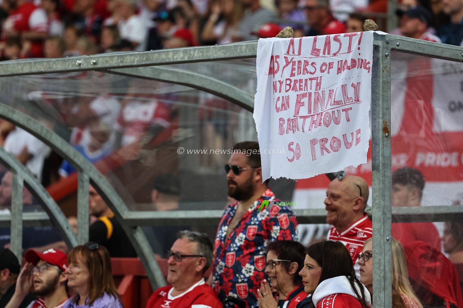 “AT LAST! 45 Years off holding my breath” home made banner is on display during the Betfred Super League Round 14 Hull KR vs Catalans Dragons at Sewell Group Craven Park, Kingston upon Hull, United Kingdom, 13th June 2025

(Photo by Mark Cosgrove/News Images)