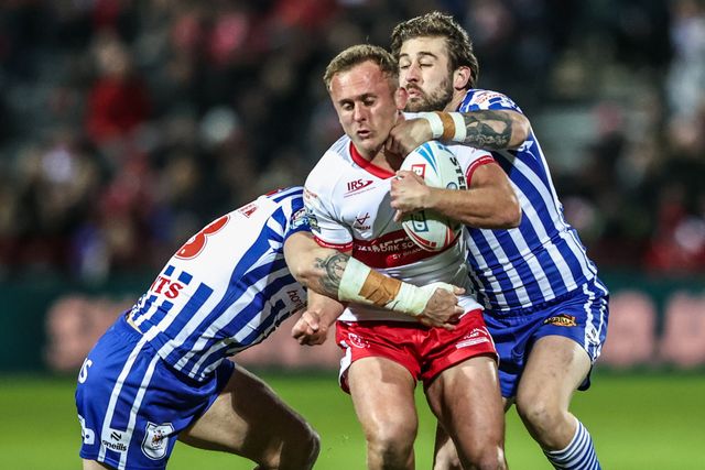 Jez Litten of Hull KR is tackled by David Klemmer of St Helens and Kyle Feldt of St Helens during the Betfred Super League round 6 match Hull KR vs St Helens at Sewell Group Craven Park, Hull, United Kingdom on 27 March 2026

(Photo by Alfie Cosgrove/News Images)