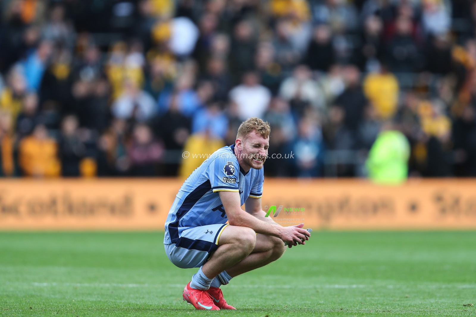 A dejected Dejan Kulusevski of Tottenham Hotspur reacts to his team's loss after the Premier League match Wolverhampton Wanderers vs Tottenham Hotspur at Molineux, Wolverhampton, United Kingdom, 13th April 2025

(Photo by Gareth Evans/News Images)