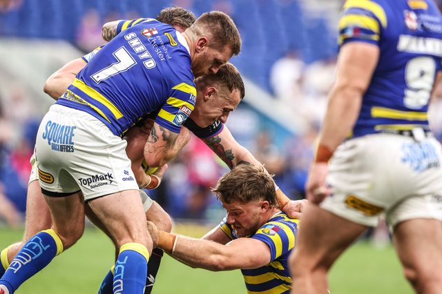 Frankie Halton of Leigh Leopards is tackled by Marc Sneyd of Warrington Wolves and Luke Thomas of Warrington Wolves during the Betfred Super League Magic Weekend match Leigh Leopards vs Warrington Wolves at Leigh Sports Village, Leigh, United Kingdom on 04 July 2026

(Photo by Alfie Cosgrove/News Images)