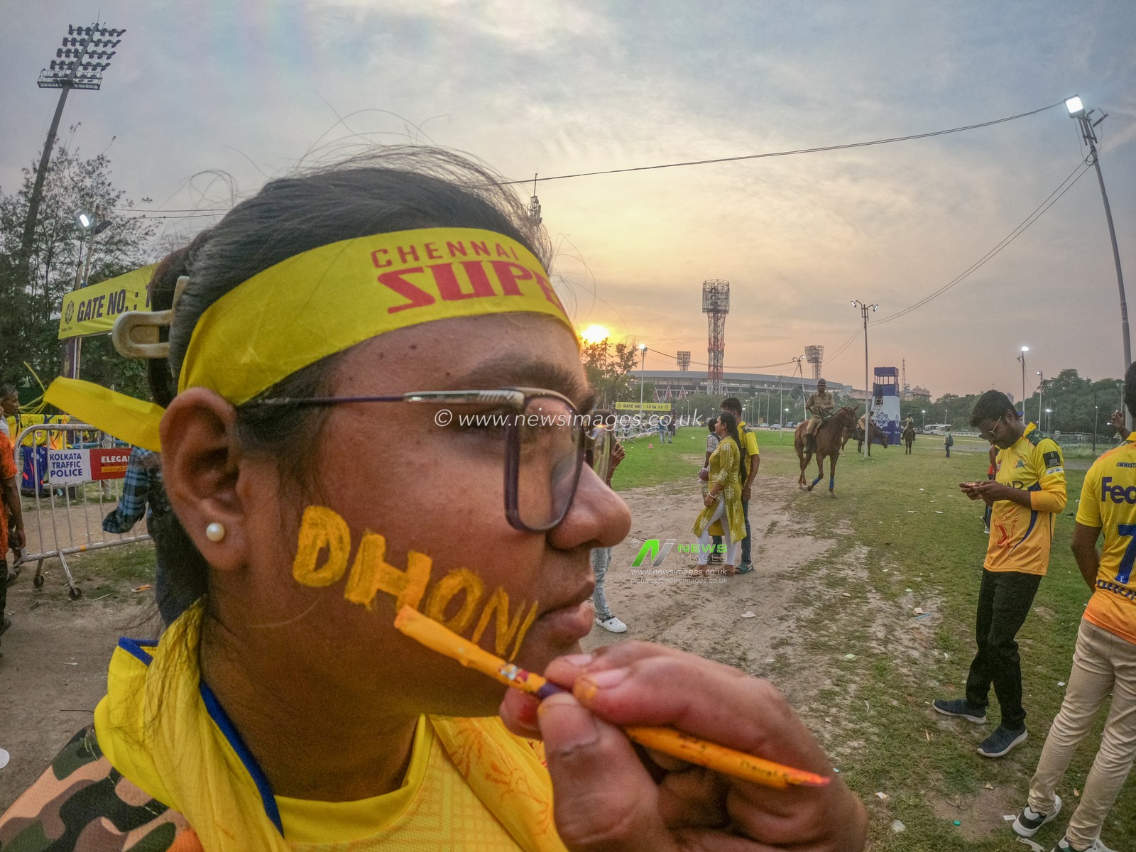 Indian Cricketer MS Dhoni have their faces painted outside the  Eden Gardens Cricket Siadum prior to the 2025 IPL match between Kolkata Knight Riders and Chennai Super Kings (CSK) in Kolkata,India on May 7,2025.Photo by Debajyoti Chakraborty.(Photo: Debajyoti Chakraborty/News Images)
