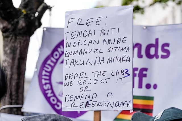 A banner asking politics detainees like former finance minister Tendai Biti and others to be released hoisted by UK-based Zimbabweans gather outside the Zimbabwe Embassy in London on 18 April 2026 to protest the Constitution of Zimbabwe Amendment (No. 3) Bill, which critics say would extend President Mnangagwa’s rule until 2030 and strip citizens of the direct vote for president.

(Photo by Maynard Manyowa/News Images)