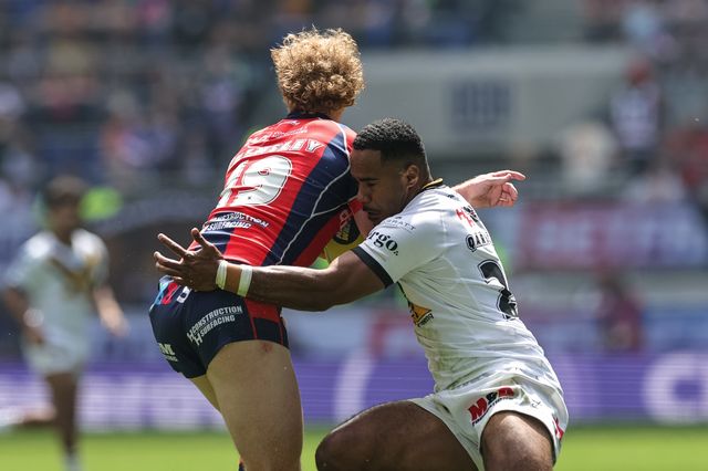 Lachlan Walmsley of Wakefield Trinity is tackled by Jason Qareqare of Castleford Tigers during the Betfred Super League Magic Weekend match Wakefield Trinity vs Castleford Tigers at Hill Dickinson Stadium, Liverpool, United Kingdom on 05 July 2026

(Photo by Mark Cosgrove/News Images)