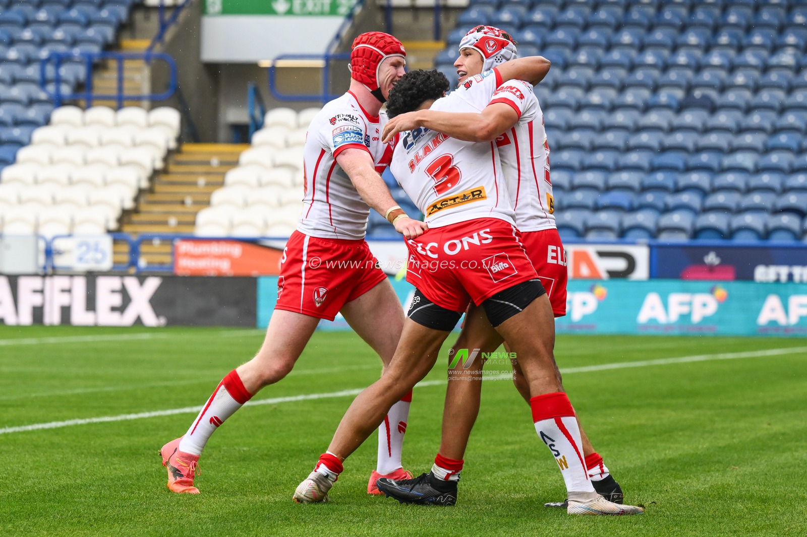 Harry Robertson of St. Helens celebrates his try during the Betfred Super League Round 24 match Huddersfield Giants vs St Helens at John Smith's Stadium, Huddersfield, United Kingdom, 1st September 2024

(Photo by Craig Thomas/News Images)