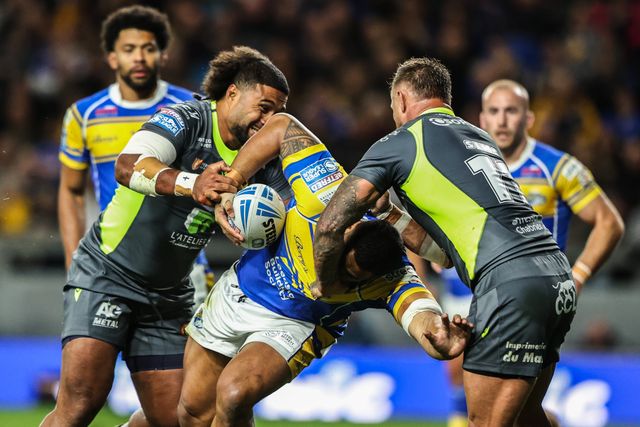 Sam Lisone of Leeds Rhinos is tackled during the Betfred Super League round 26 match Leeds Rhinos vs Catalans Dragons at Headingley Stadium, Leeds, United Kingdom, 11th September 2025

(Photo by Alfie Cosgrove/News Images)