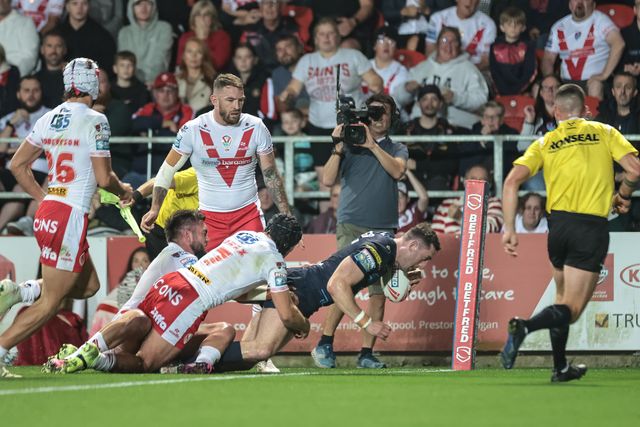 Jake Wardle of Wigan Warriors goes over for a try during the Betfred Super League Round 25 match St Helens vs Wigan Warriors at Totally Wicked Stadium, St Helens, United Kingdom, 5th September 2025

(Photo by Mark Cosgrove/News Images)