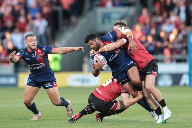 Rhyse Martin of Hull KR is tackled by Matty Foster of Salford Red Devils and Joe Mellor of Salford Red Devils during the Betfred Super League Round 20 Salford Red Devils vs Hull KR at Salford Community Stadium, Eccles, United Kingdom, 31st July 2025

(Photo by Mark Cosgrove/News Images)