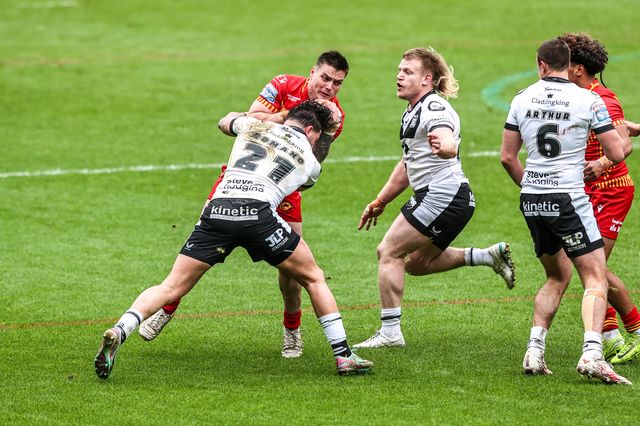 Zac Lipowicz of Catalans Dragons is tackled by Arthur Romano of Hull FC during the Betfred Super League round 6 match Hull FC vs Catalans Dragons at MKM Stadium, Hull, United Kingdom on 29 March 2026

(Photo by Alfie Cosgrove/News Images)