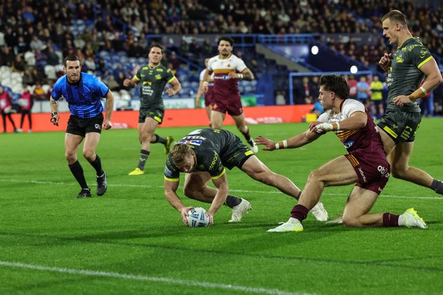 Lachie Miller of Leeds Chinos goes over for a try during the Betfred Super League round 8 match Huddersfield Giants vs Leeds Rhinos at Accu Stadium, Huddersfield, United Kingdom on 17 April 2026

(Photo by Mark Cosgrove/News Images)