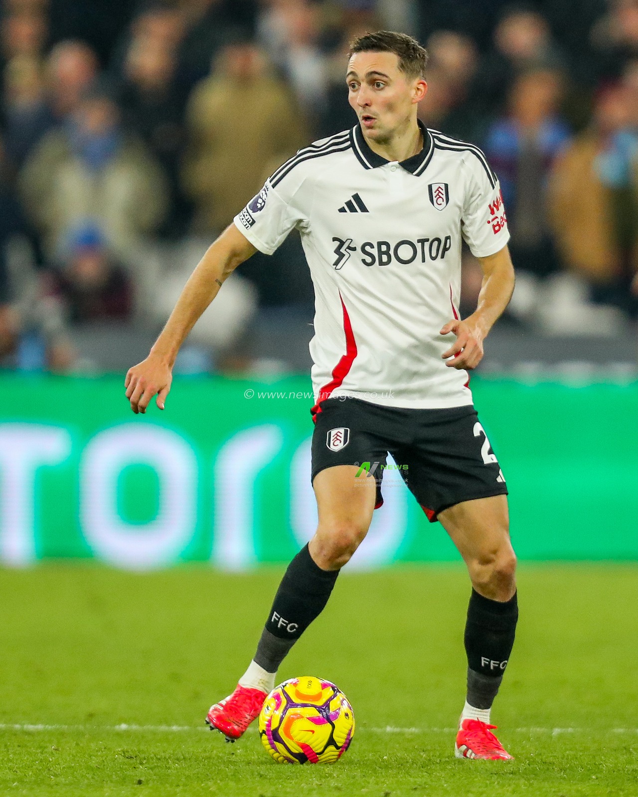 Timothy Castagne of Fulham runs with the ball during the Premier League match West Ham United vs Fulham at London Stadium, London, United Kingdom, 14th January 2025

(Photo by Izzy Poles/News Images)
