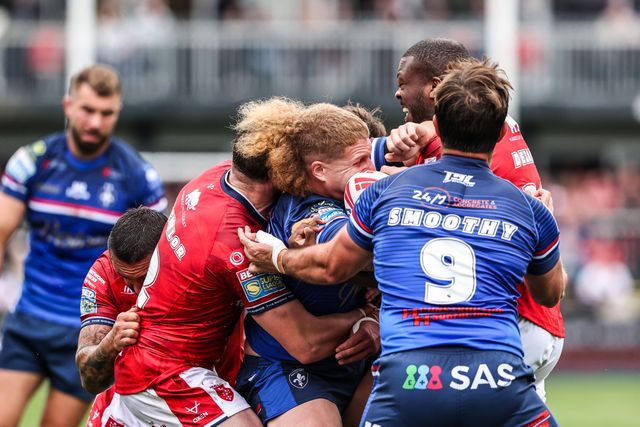 Caius Faatili of Wakefield Trinity is tackled by Jordan Dezaria of Hull KR during the Betfred Super League round 13 match Wakefield Trinity vs Hull KR at DIY Kitchens Stadium, Wakefield, United Kingdom on 06 June 2026

(Photo by Alfie Cosgrove/News Images)
